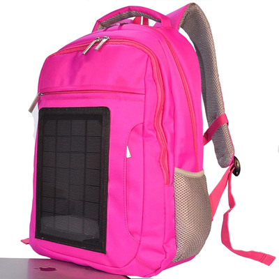 A trouxa de carregamento solar de caminhada das mulheres cor-de-rosa com o carregador construído dentro